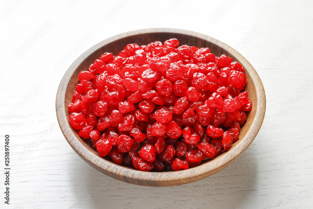 Bowl with tasty cherries on wooden background. Dried fruits as healthy food Bowl with tasty cherries on wooden background. Dried fruits as healthy food