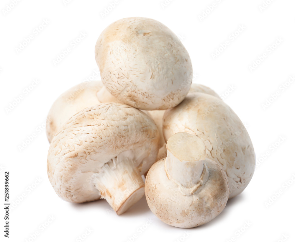Fresh champignon mushrooms isolated on white. Healthy food Fresh champignon mushrooms isolated on white. Healthy food