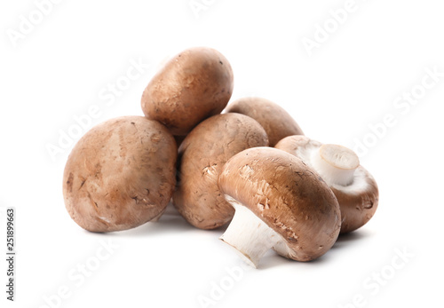 Fresh champignon mushrooms isolated on white. Healthy food