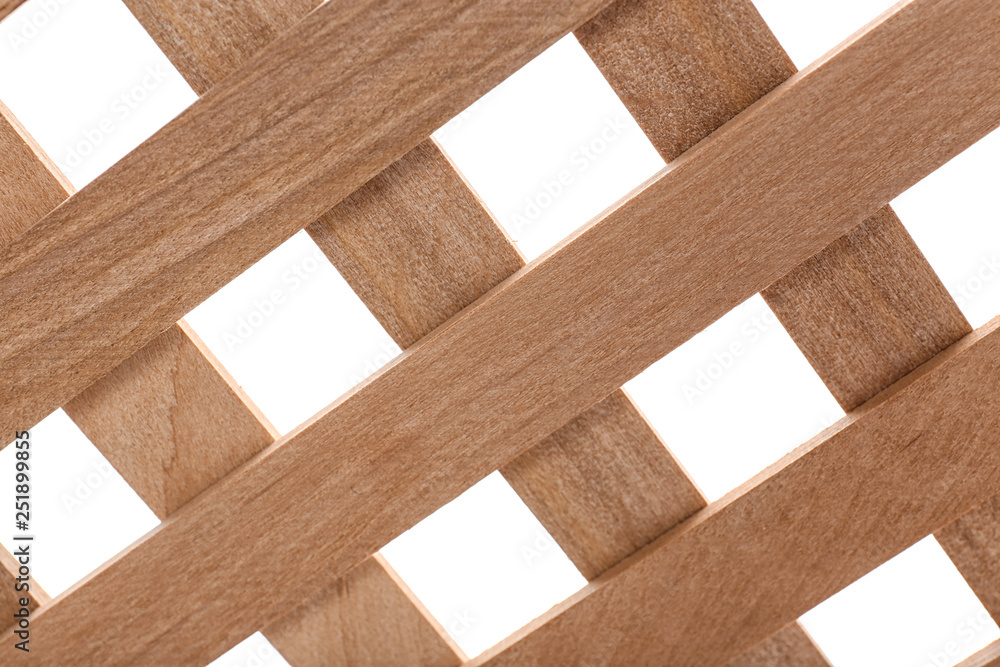Crossed wooden planks on white background, closeup Crossed wooden planks on white background, closeup