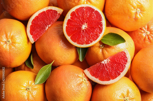 Φωτογραφία Many fresh ripe grapefruits as background, top view