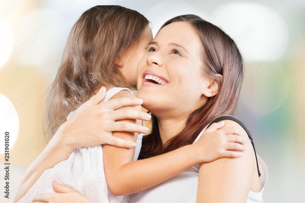 Happy Mother and daughter hugging Happy Mother and daughter hugging