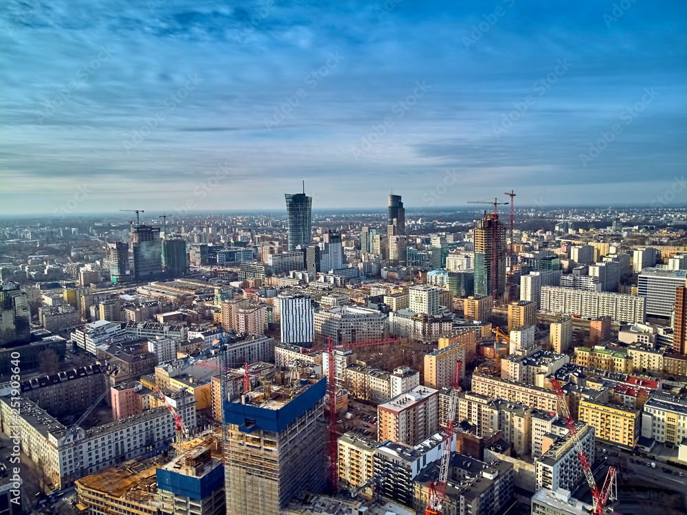 Beautiful panoramic aerial drone view to the center of Warsaw City and Varso - neomodern office building under construction, designed by Foster and Partners