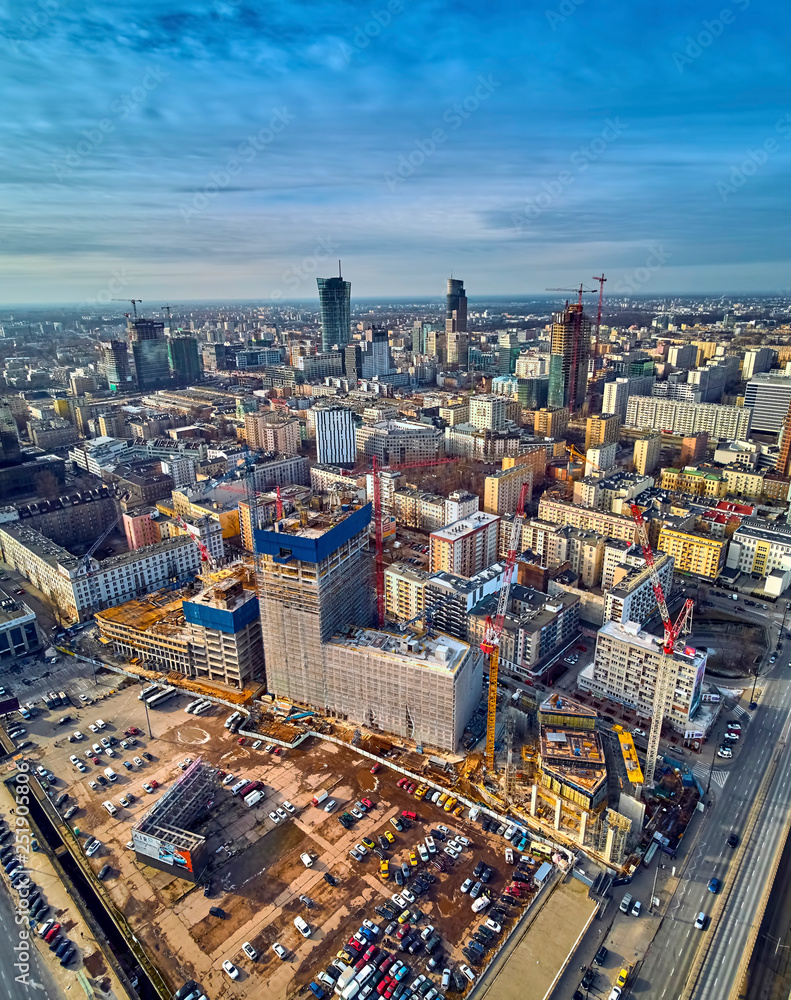 Beautiful panoramic aerial drone view to the center of Warsaw City and Varso - neomodern office building under construction, designed by Foster and Partners