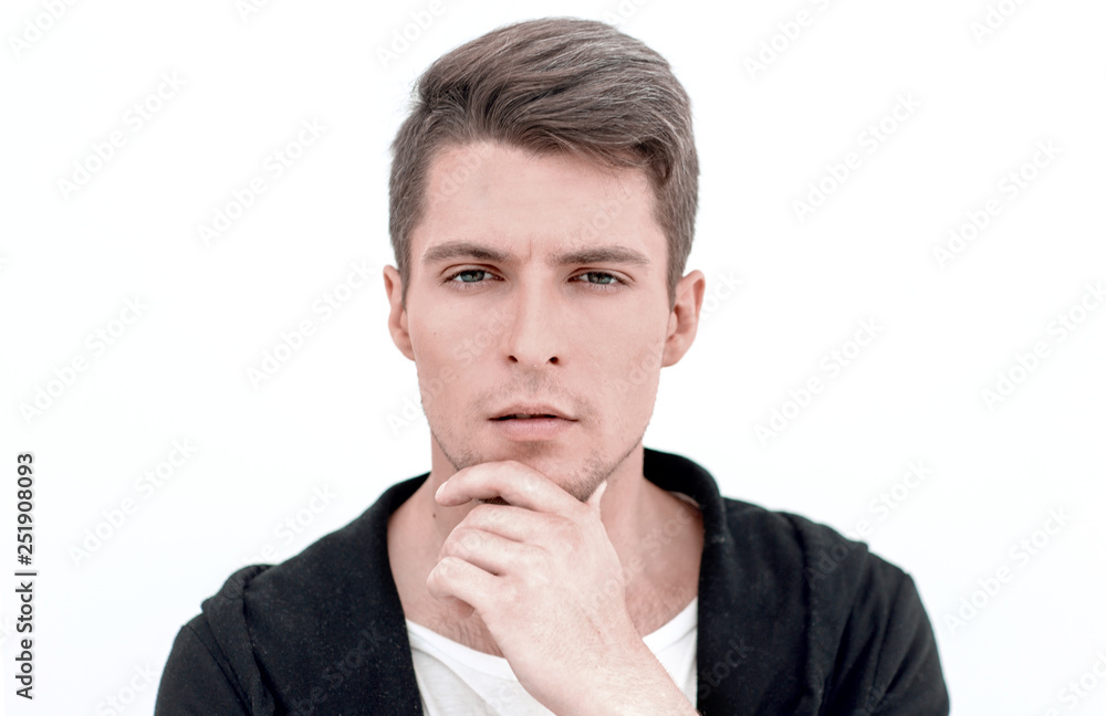 close up.portrait of a thoughtful young man close up.portrait of a thoughtful young man