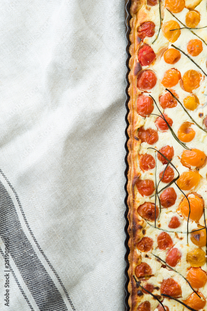 Homemade pie ( quiche) with ricotta, fresh colored tomatoes Homemade pie ( quiche) with ricotta, fresh colored tomatoes