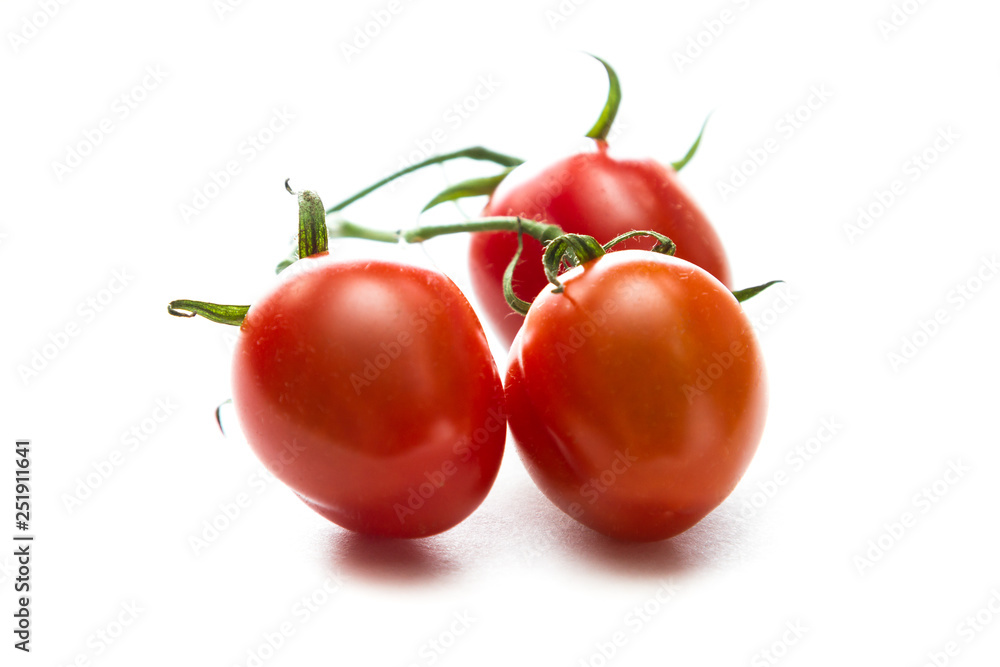 Strawberry tomatoes over white Strawberry tomatoes over white