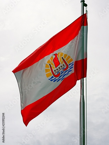Flag of French Polynesia waving on a mast