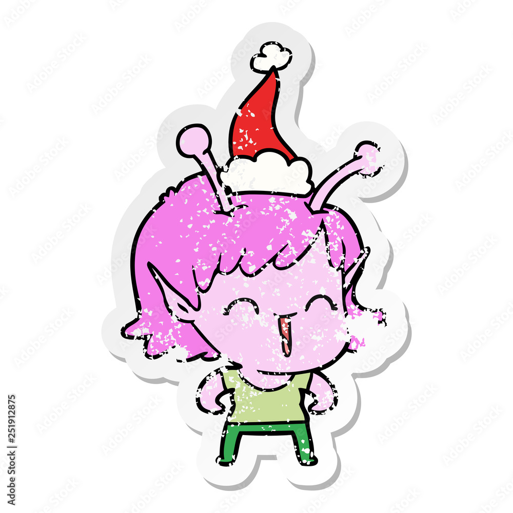 distressed sticker cartoon of a alien girl laughing wearing santa hat distressed sticker cartoon of a alien girl laughing wearing santa hat