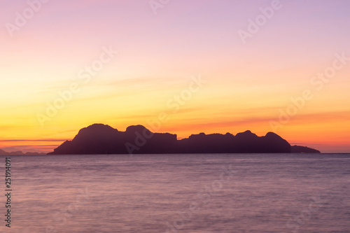 Sunrise view from Ko Ngai island  Trang Province  Southern Thailand with beautiful sea water  twilight sky.