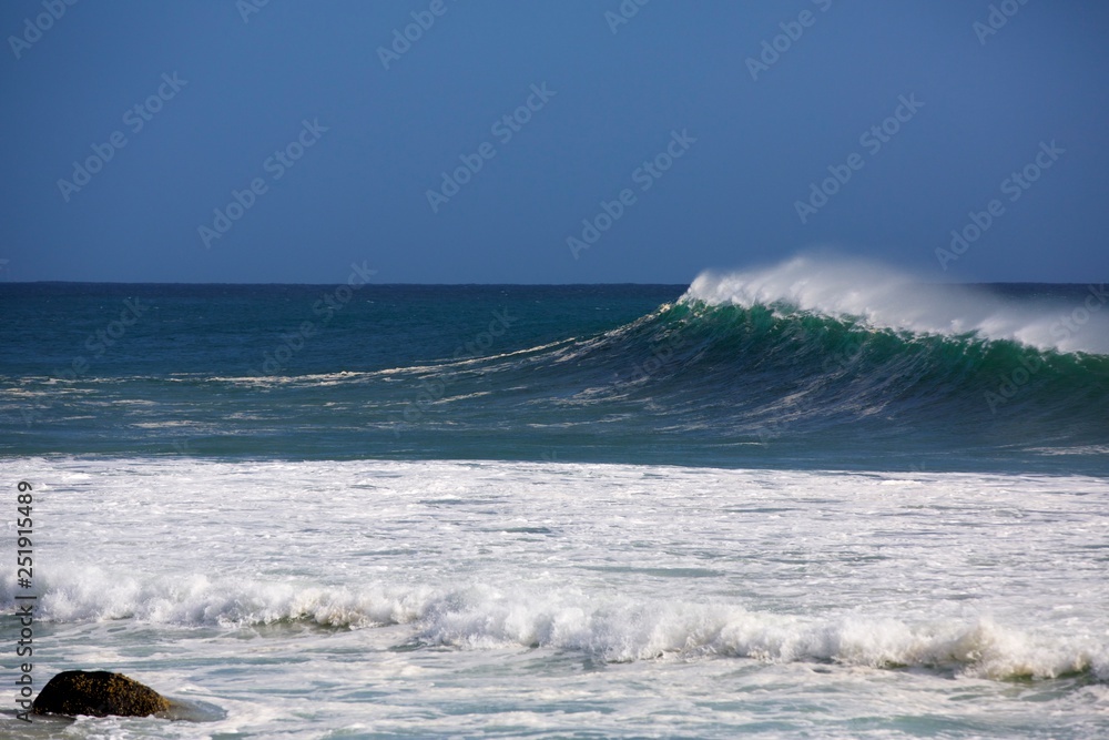 Perfect waves and surfing at Snapper Rocks during Cyclone Oma, Gold Coast., Queensland Australia