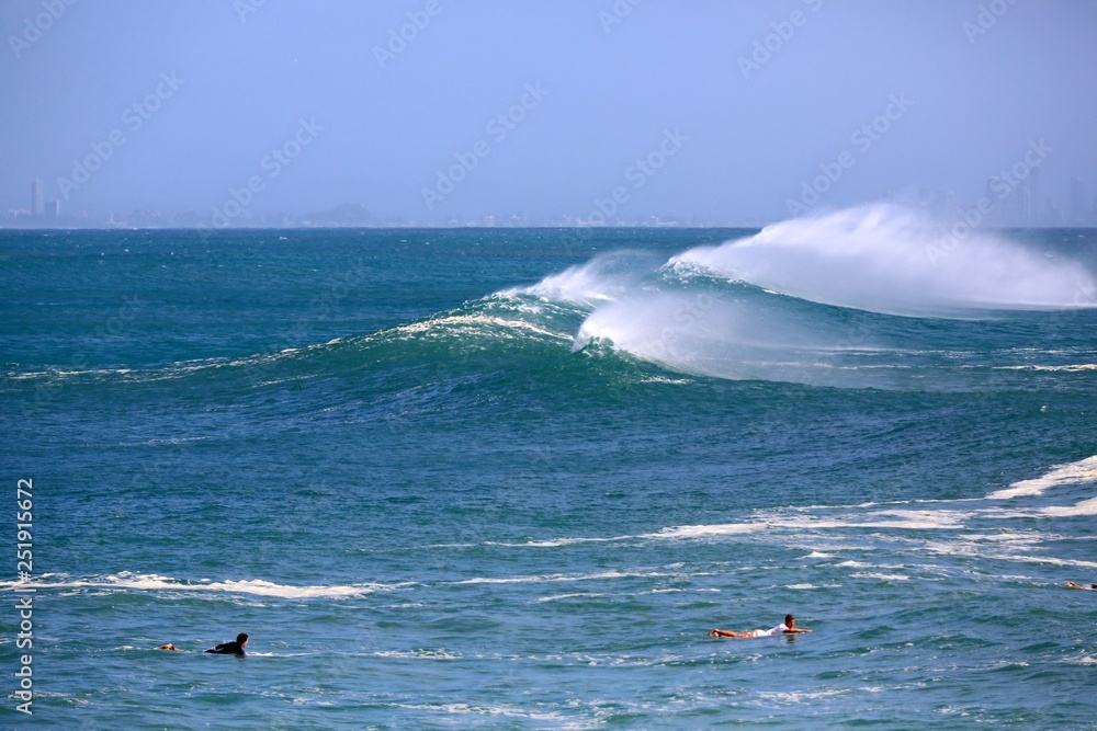 Perfect waves and surfing at Snapper Rocks during Cyclone Oma, Gold Coast., Queensland Australia