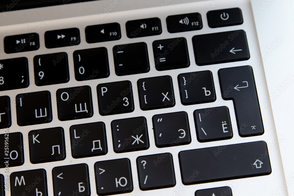 Close up of keyboard of a modern laptop. Enter button