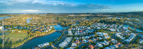 Fotografie Aerial panorama of luxury suburb on the Gold Coast at sunset.