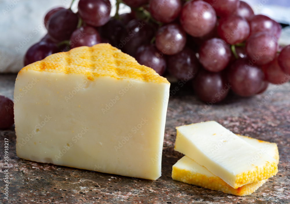 Saint Paulin creamy, mild, semi-soft French cheese made from pasteurized cow milk, originally made by Trappist monks