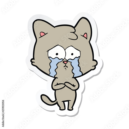 sticker of a cartoon crying cat