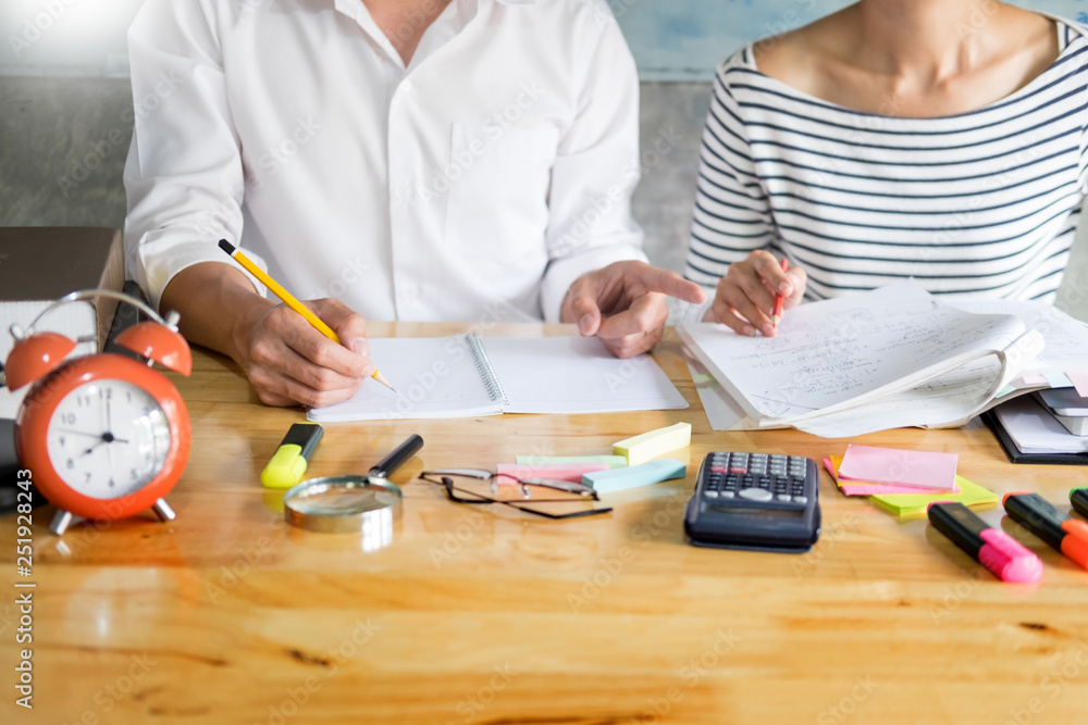 woman learn and teach tutor concept education  helping each other sitting in a table at class room.