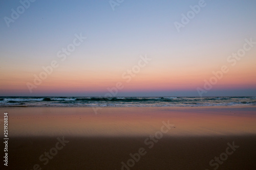 sunset on beach © GEOLEE