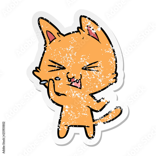 distressed sticker of a cartoon cat hissing
