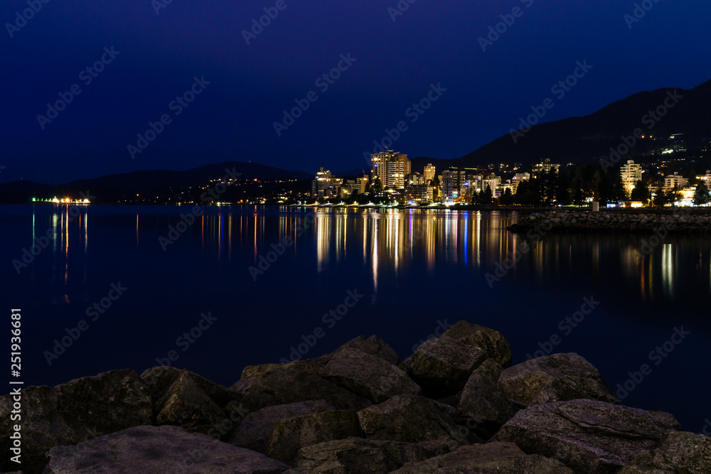 west vancouver night scene with reflection in Burrard Inlet.