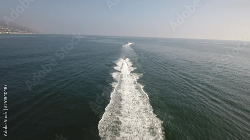 yacht in the ocean, aerial shot in malibu, california 