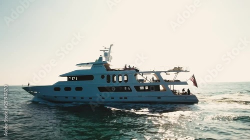 yacht in the ocean, aerial shot in malibu, california 