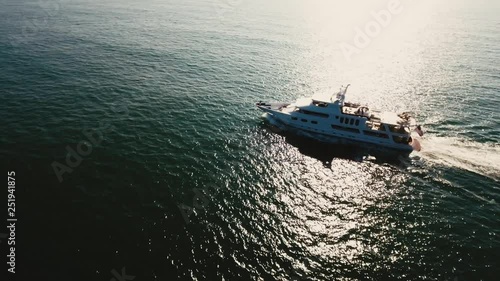 yacht in the ocean, aerial shot in malibu, california 