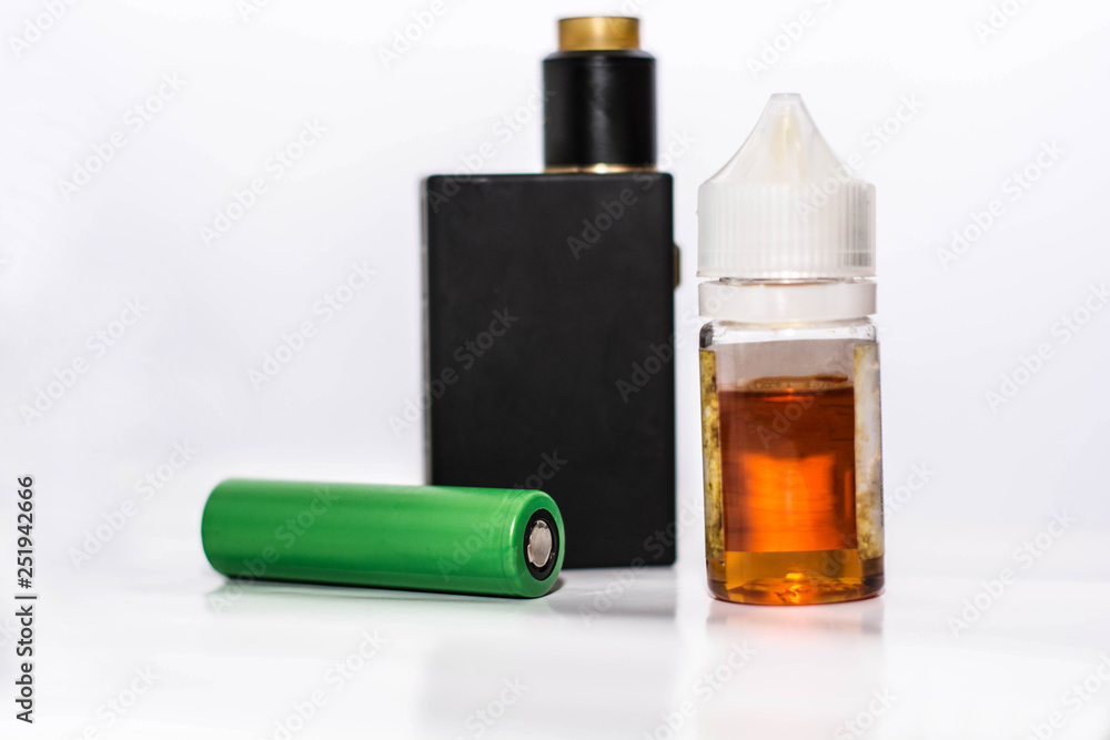 Fototapeta premium electronic cigarete with battery and liquid, personal vaporizer with battery and liquid