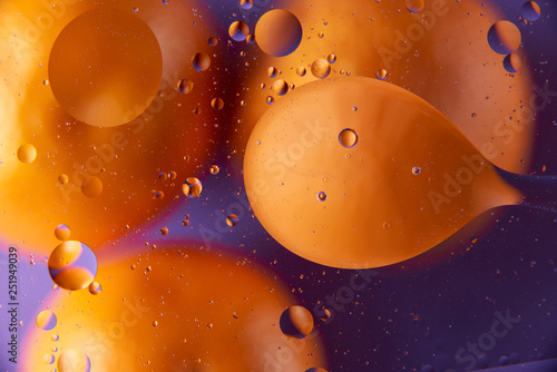 abstract background of colored drops bubbles on the water