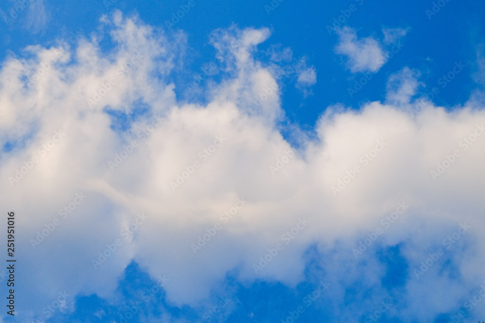 blue sky with clouds and sun