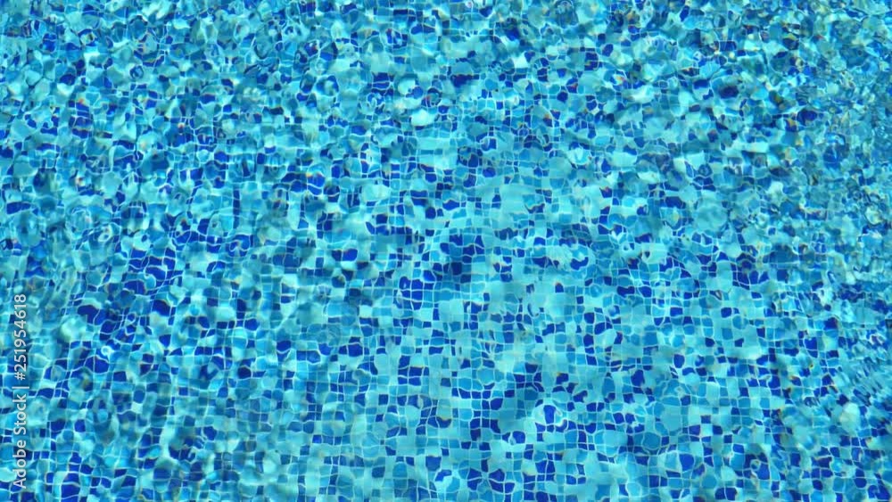 Surface of ripped water in swimming pool. Abstract background Surface of ripped water in swimming pool. Abstract background