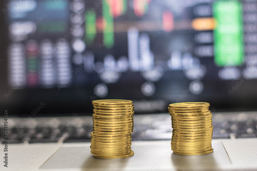 Gold coin with monitor shows trading traffic, Bitcoin minning Gold coin with monitor shows trading traffic, Bitcoin minning