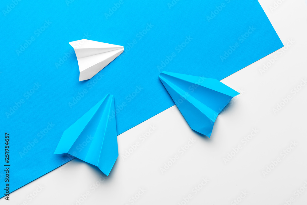 Group of paper planes on blue background. Business for new ideas creativity and innovative solution concepts Group of paper planes on blue background. Business for new ideas creativity and innovative solution concepts
