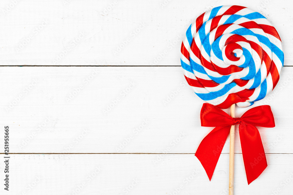 Obraz premium sugar lollipop on the wooden table