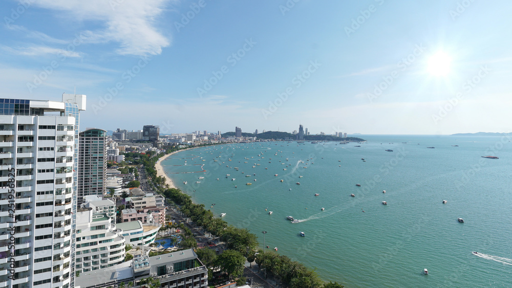 Fototapeta premium Aerial top view. Many sailing, motor, speed boats, Sailing ships, sailboats at Pattaya city, Thailand.