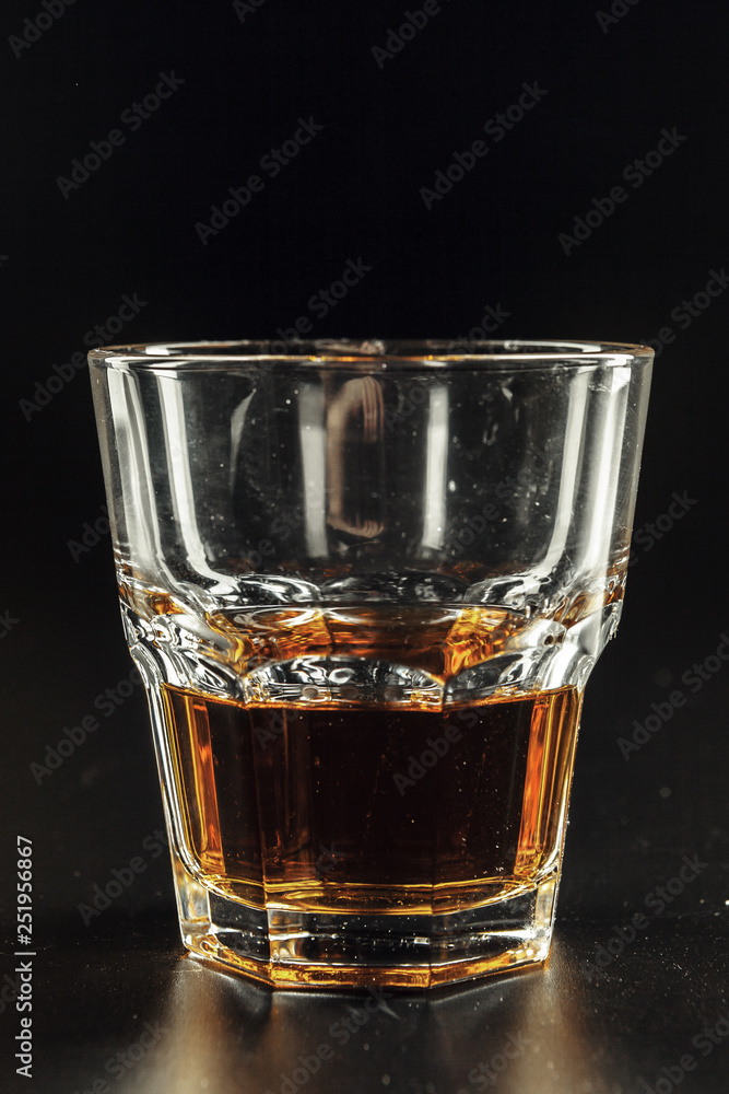 Close-up of glass with whiskey Close-up of glass with whiskey