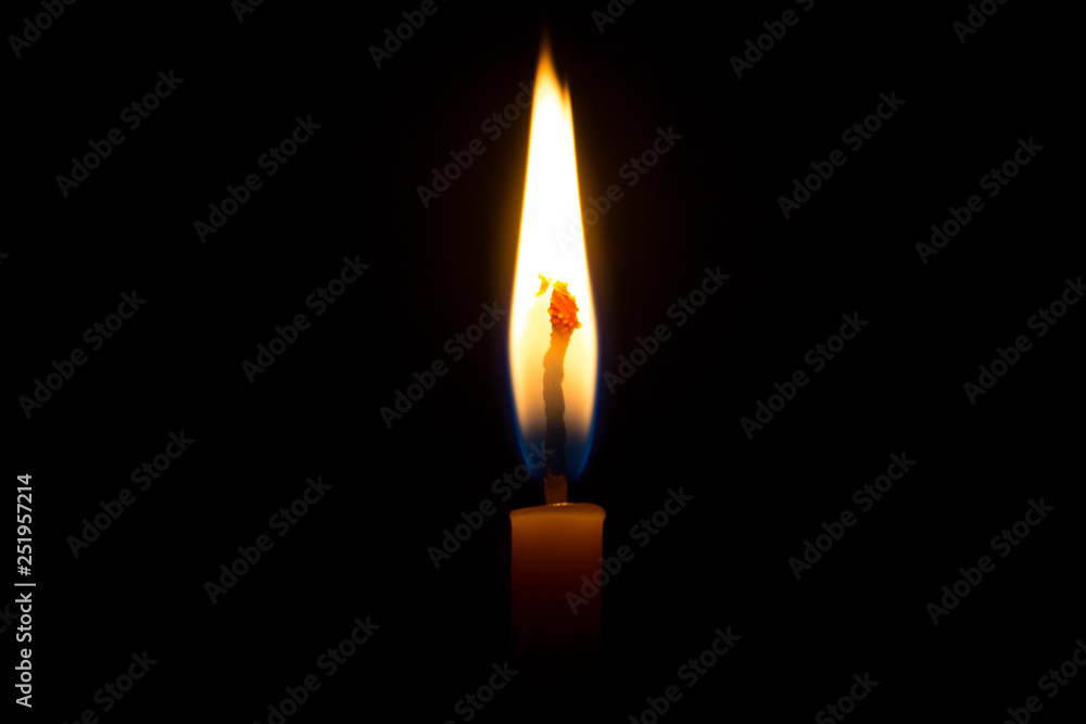 Candle flame on black background Candle flame on black background