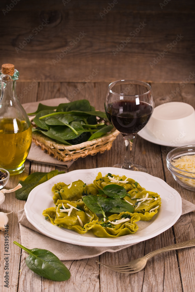 Spinach ravioli with ricotta cheese filling. Spinach ravioli with ricotta cheese filling.