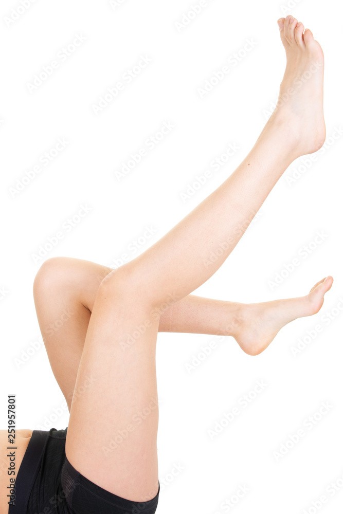 Long slim pretty woman legs isolated on white background Long slim pretty woman legs isolated on white background