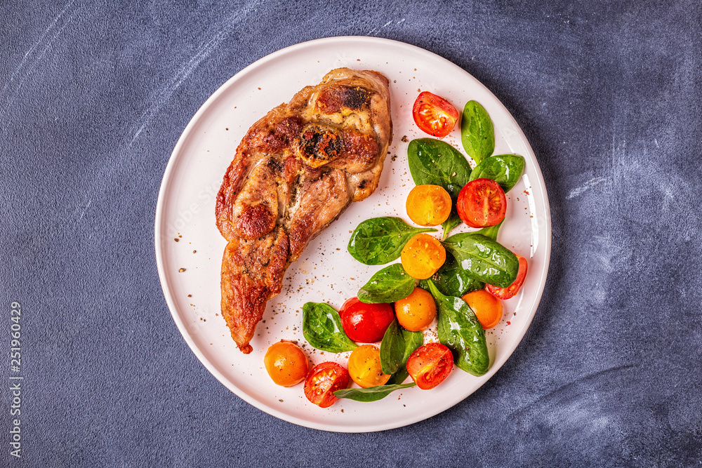 Roasted turkey steak with salad. Roasted turkey steak with salad.