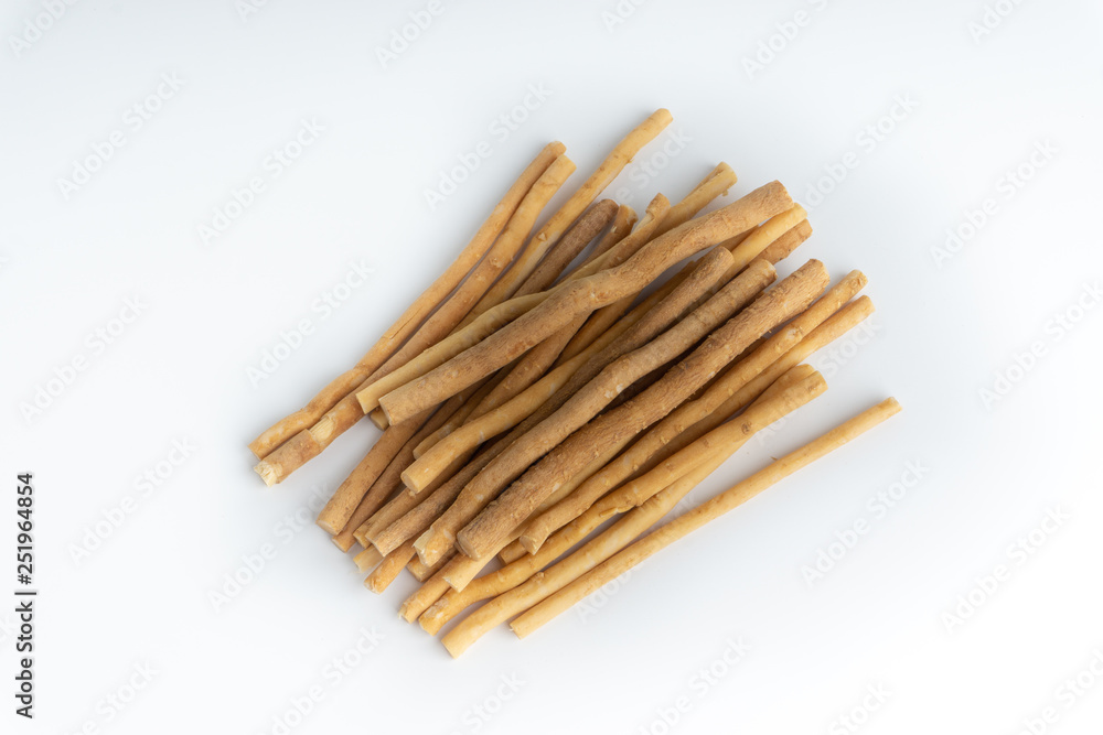 Natural toothbrush Miswak (Kayu Sugi) on white background 