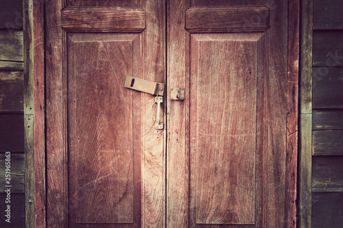 Old wooden window on yellow wall for vintage background