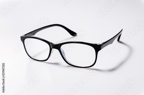 Black eye glasses spectacles with shiny black frame For reading daily life To a person with visual impairment isolaged on white background.