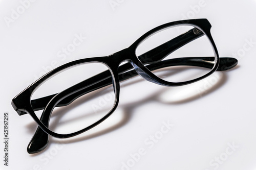 Black eye glasses spectacles with shiny black frame For reading daily life To a person with visual impairment isolaged on white background.