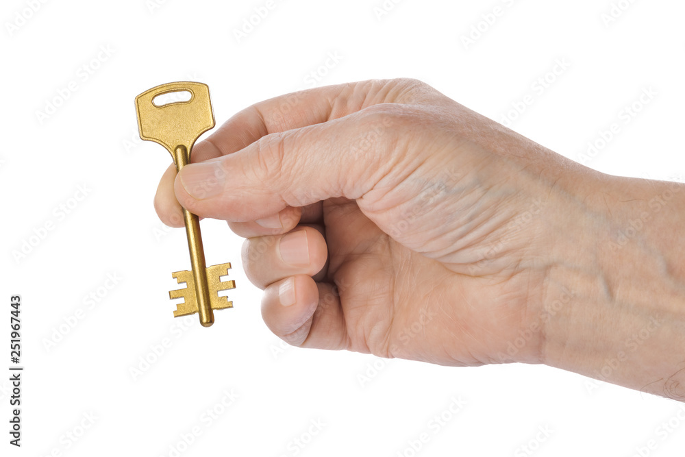 Hand with gold key Hand with gold key