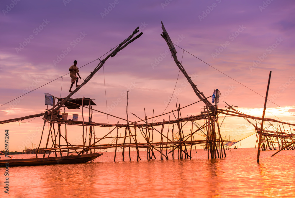 Landscape of traditional fishing with sunrise. Landscape of traditional fishing with sunrise.