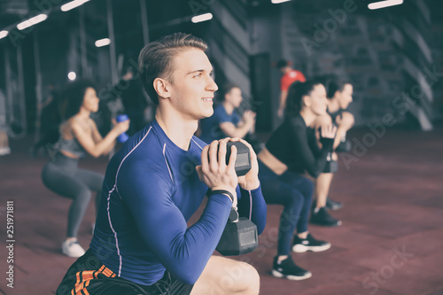 Group of athletes working o...