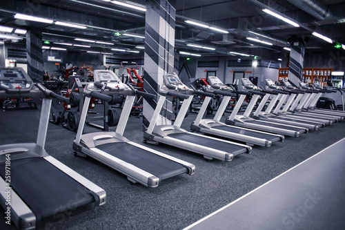 Modern equipment in new gym indoors