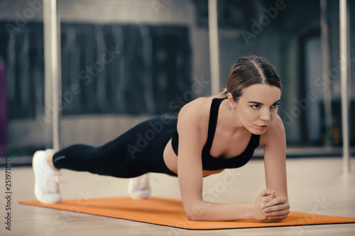 Young woman training in mod...