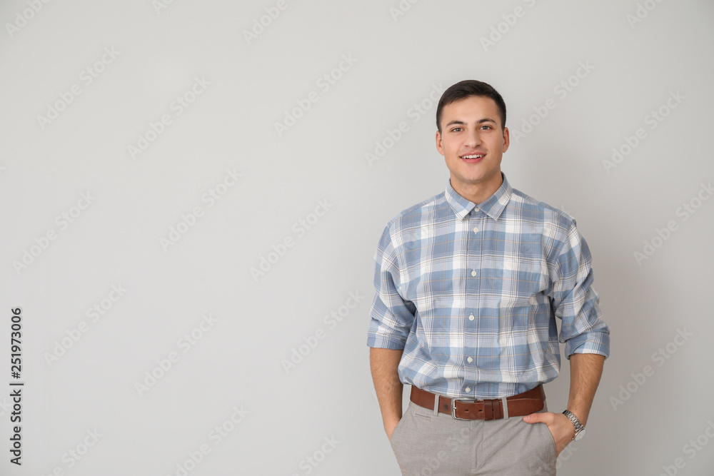 Portrait of young businessman on light background Portrait of young businessman on light background